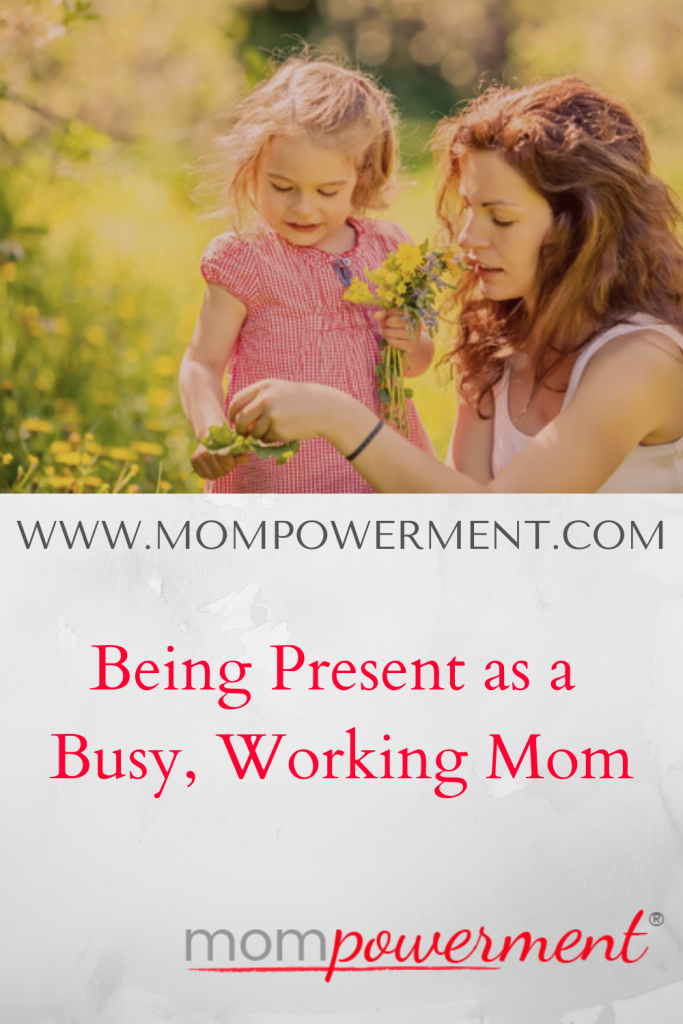 Being Present as a Busy, Working Mom Mompowerment with Mom and child looking at flower