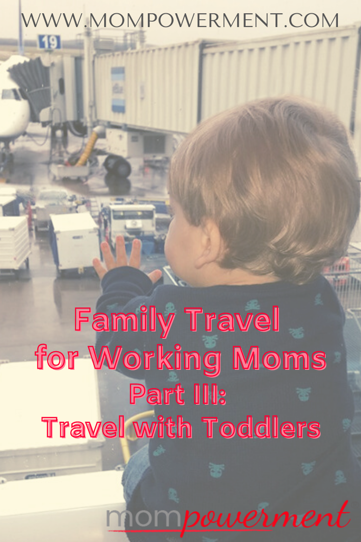 Young child looking out the window at an airport Family Travel for Working Moms: Part III Travel with a Toddler