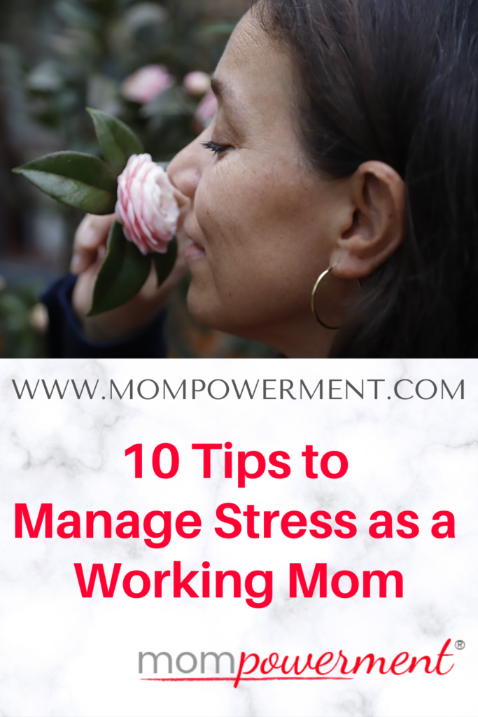 Woman smelling a rose 10 Tips to Manage Stress as a Working Mom Mompowerment