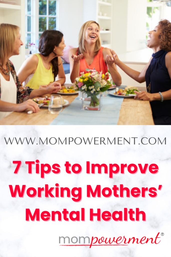 Group of women laughing seated at a table 7 Tips to Improve Working Mothers’ Mental Health Mompowerment