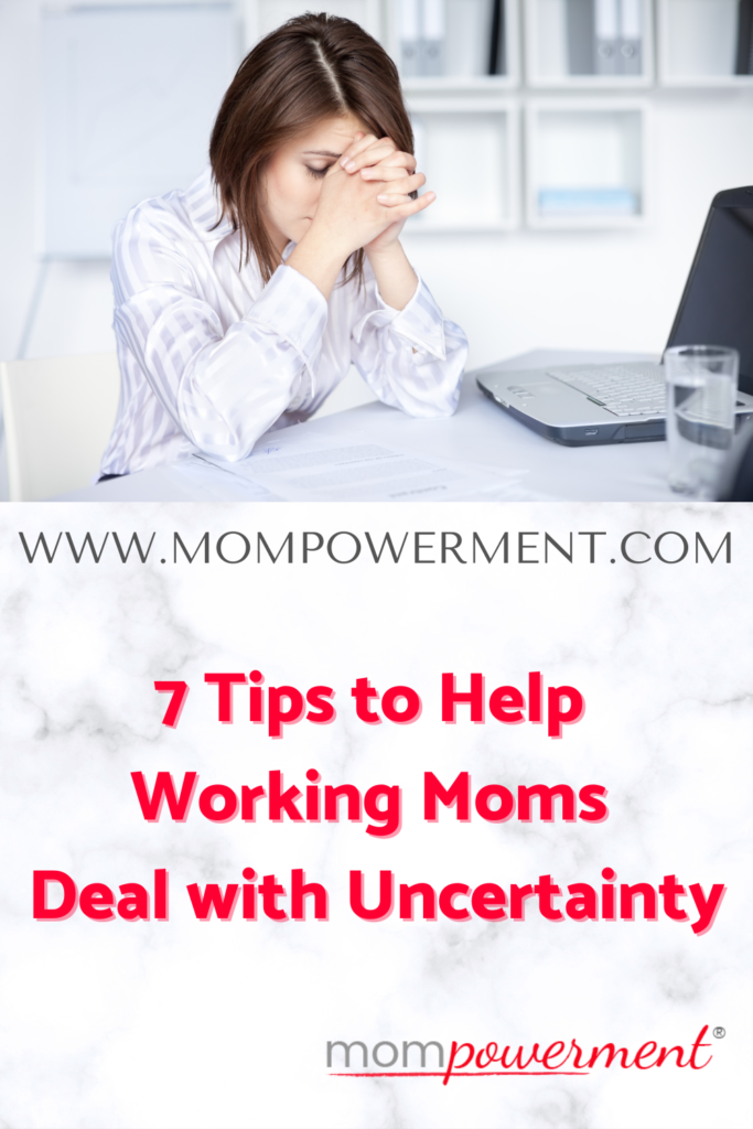 Woman with her head in her hands 7 Tips to help working moms deal with uncertainty Mompowerment